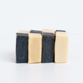 Stack of The Dynamic Duo Handcrafted Goat Milk Soap Bars by Basilwood Farm.