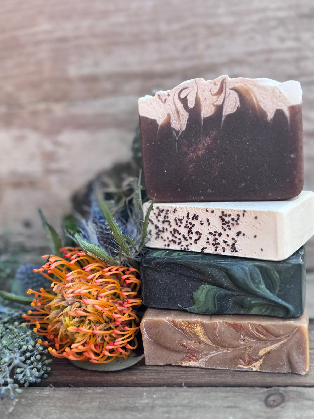 “Basilwood Farm fall goat milk soap bundle displayed as gift set with cozy fall decor”