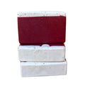 Stack of Strawberry Fields Handcrafted Goat Milk Soap Bars by Basilwood Farm.