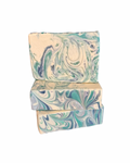 Stack of Cayucos Handcrafted Goat Milk Soap Bars by Basilwood Farm.