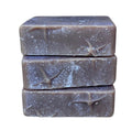 Stack of three Coffee Butter Energizing Exfoliating Goat Milk Soap Bars.