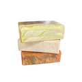 Stack of Summer Vacation Handcrafted Goat Milk Soap Bars by Basilwood Farm.