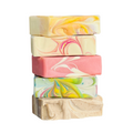 Stack of Six Handcrafted Goat Milk Soap Bars by Basilwood Farm.