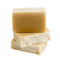 Stack of three Itch Be Gone Handcrafted Goat Milk Soap Bars by Basilwood Farm.