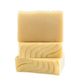 Stack of Sandalwood Handcrafted Goat Milk Soap Bars by Basilwood Farm.